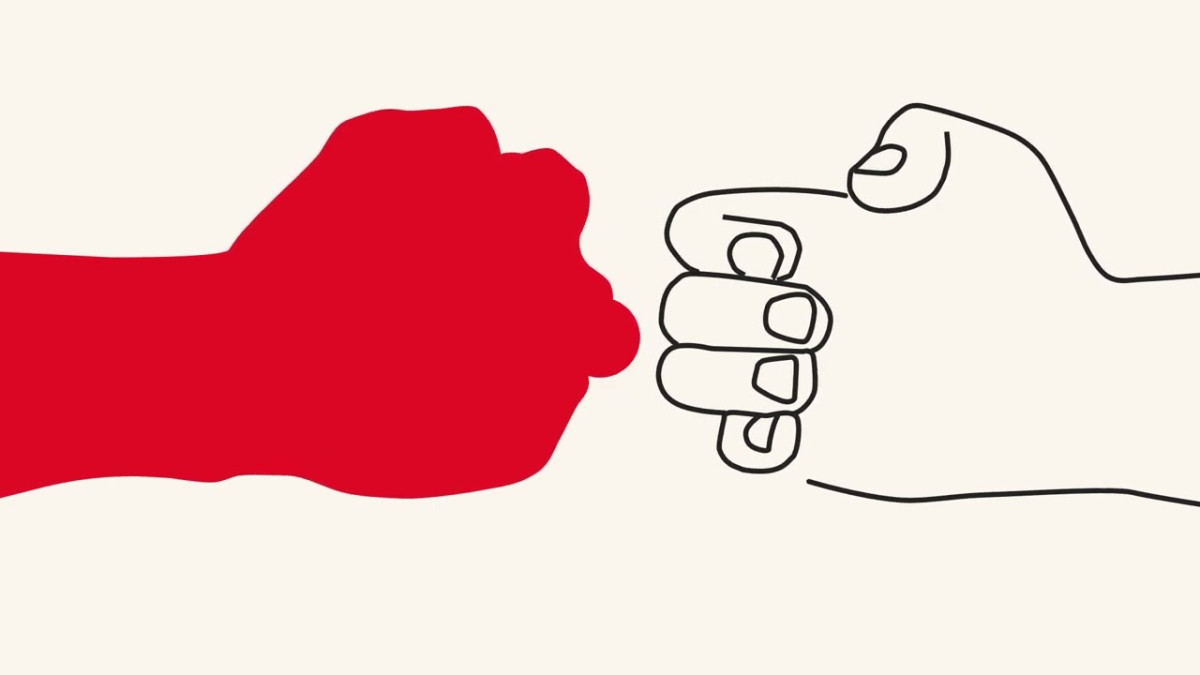 Vuist rood en zwart raken elkaar aan